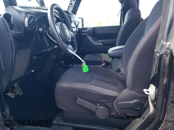 2013 Jeep Wrangler Sport with VIN 1C4AJWAG5DL694110, listed as a Copart auction lot 52200885 with 187,924 mi miles and Salvage Title. Bid and sale history available at carsss.com. Image 7.