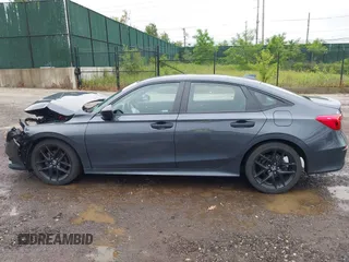 2023 Honda Civic Sport with VIN 2HGFE2F5XPH515699, listed as a IAAI auction lot 42441217 with 44,595 mi miles and . Bid and sale history available at DreamBid. Image 14.