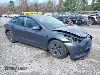 2023 Tesla Model 3 z VIN 5YJ3E1EA5PF451085, wystawiony jako IAAI lot #41941655 z przebiegiem 56 532 mil mil oraz . Historia ofert i sprzedaży dostępna na DreamBid. Obrazek 1.