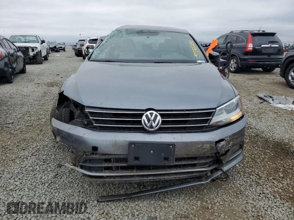 2015 Volkswagen Jetta SE with VIN 3VWD17AJ9FM329149, listed as a Copart auction lot 59561285 with 111,552 mi miles and Salvage title. Bid and sale history available at DreamBid. Image 5.
