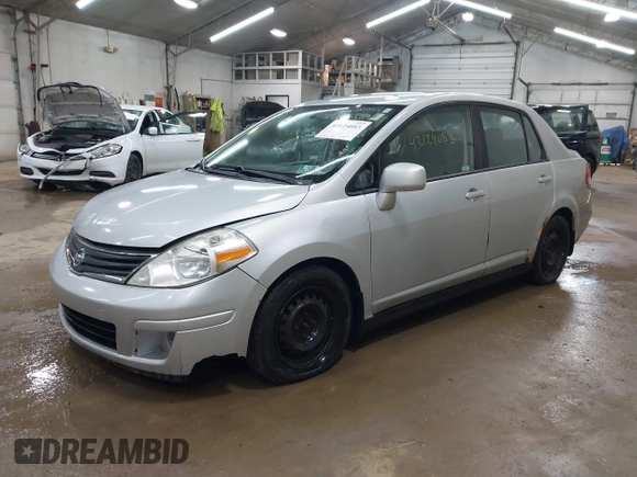 2011 Nissan Versa S with VIN 3N1BC1AP5BL465531, listed as a IAAI auction lot 42124083 with 249,641 mi miles and . Bid and sale history available at DreamBid. Image 2.