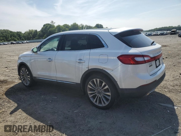 2016 Lincoln MKX Reserve with VIN 2LMTJ8LPXGBL38015, listed as a Copart auction lot 60981375 with 101,589 mi miles and Salvage title. Bid and sale history available at DreamBid. Image 2.