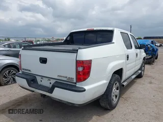 2010 Honda Ridgeline RT z VIN 5FPYK1F20AB004961, wystawiony jako IAAI lot #42120833 z przebiegiem 311 486 mil mil oraz . Historia ofert i sprzedaży dostępna na DreamBid. Obrazek 4.