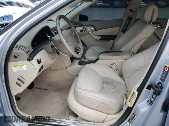 2005 Mercedes-Benz S-Class 5.0L with VIN WDBNG75J05A452316, listed as a Copart auction lot 82888994 with 167,954 mi miles and Salvage Title. Bid and sale history available at carsss.com. Image 7.