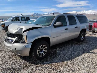 2009 Chevrolet Suburban LS with VIN 1GNFC16079R211582, listed as a Copart auction lot 50649205 with 258,057 mi miles and Salvage Title. Bid and sale history available at carsss.com. Image 1.