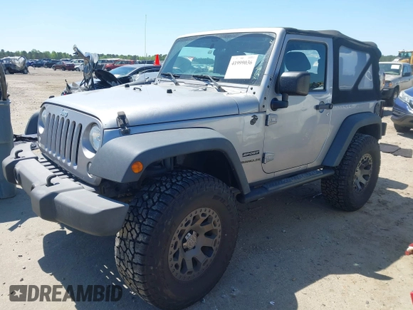 2015 Jeep Wrangler Sport with VIN 1C4AJWAG3FL696988, listed as a IAAI auction lot 41999036 with 79,064 mi miles. Bid and sale history available at carsss.com. Image 17.