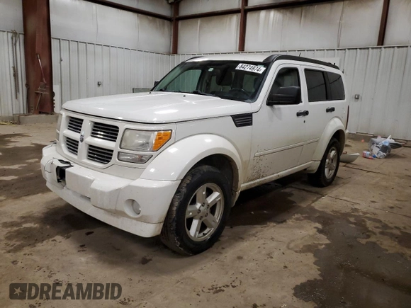 2010 Dodge Nitro SXT z VIN 1D4PT5GK8AW158064, wystawiony jako Copart lot #84274974 z przebiegiem 202 668 mil mil oraz Czysty tytuł • Clean title. Historia ofert i sprzedaży dostępna na DreamBid. Obrazek 1.
