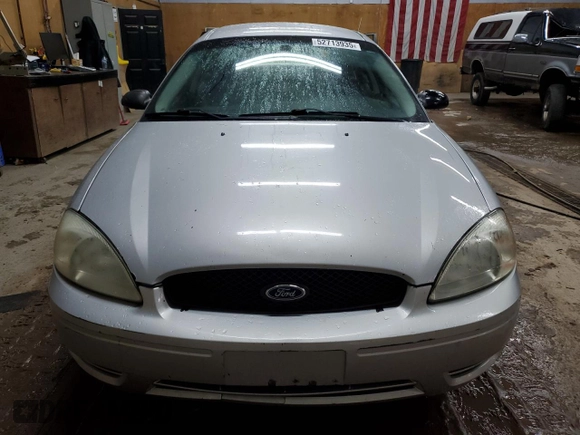 2004 Ford Taurus SE with VIN 1FAFP53224G175353, listed as a Copart auction lot 52713935 with 213,375 mi miles and Salvage Title. Bid and sale history available at DreamBid. Image 5.