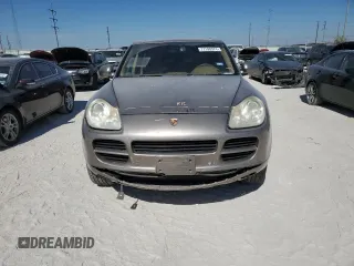 2006 Porsche Cayenne S with VIN WP1AB29P26LA61060, listed as a Copart auction lot 77146574 with 100,216 mi miles and Salvage Title. Bid and sale history available at carsss.com. Image 5.