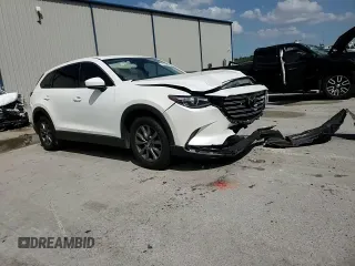 2023 Mazda CX-9 Touring z VIN JM3TCBCY6P0647537, wystawiony jako Copart lot #51578145 z przebiegiem 51 316 mil mil oraz Nie do naprawy • Non repairable. Historia ofert i sprzedaży dostępna na DreamBid. Obrazek 12.