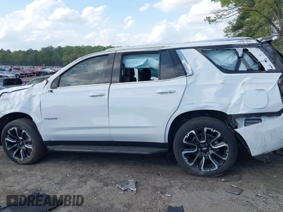 2023 Chevrolet Tahoe LS with VIN 1GNSCMKD5PR240763, listed as a IAAI auction lot 41931972 with 17,939 mi miles and . Bid and sale history available at DreamBid. Image 14.