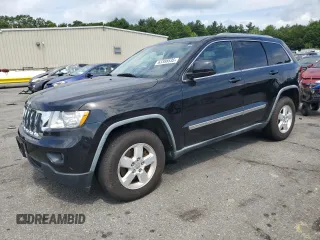 2011 Jeep Grand Cherokee Laredo with VIN 1J4RR4GG5BC572376, listed as a Copart auction lot 63388535 with 135,995 mi miles and Clean title. Bid and sale history available at DreamBid. Image 1.