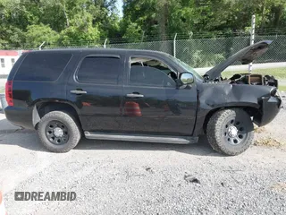 2013 Chevrolet Tahoe Commercial with VIN 1GNLC2E00DR265941, listed as a IAAI auction lot 42289977 with 206,840 mi miles and . Bid and sale history available at DreamBid. Image 12.