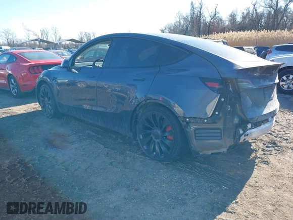 2023 Tesla Model Y Performance with VIN 7SAYGDEF1PF674417, listed as a IAAI auction lot 41421594 with 28,928 mi miles and . Bid and sale history available at DreamBid. Image 3.