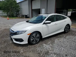 2017 Honda Civic EX-L z VIN 19XFC1F74HE014241, wystawiony jako Copart lot #59005745 z przebiegiem 55 629 mil mil oraz Czysty tytuł • Clean title. Historia ofert i sprzedaży dostępna na DreamBid. Obrazek 1.