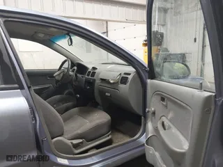 2003 Kia Rio with VIN KNADC125536274171, listed as a IAAI auction lot 41986369 with 59,837 mi miles. Bid and sale history available at carsss.com. Image 5.