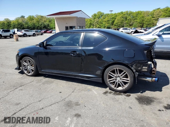 2011 Scion tC z VIN JTKJF5C70B3016542, wystawiony jako Copart lot #55829715 z przebiegiem 99 791 mil mil oraz Szkoda całkowita • Salvage title. Historia ofert i sprzedaży dostępna na DreamBid. Obrazek 2.