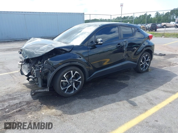 2019 Toyota C-HR XLE with VIN NMTKHMBX4KR096569, listed as a IAAI auction lot 42147017 with 111,569 mi miles and . Bid and sale history available at DreamBid. Image 2.