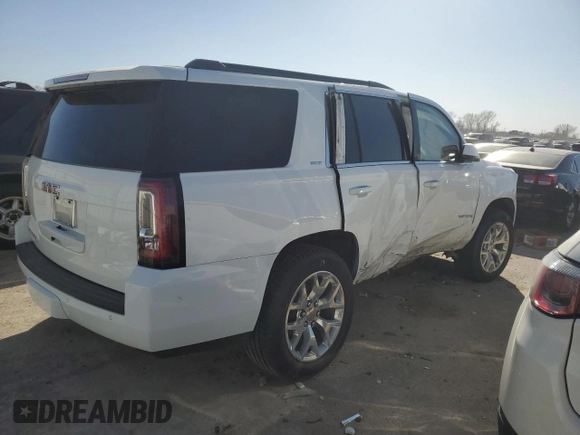 2015 GMC Yukon SLT z VIN 1GKS2BKC9FR539411, wystawiony jako Copart lot #48336835 z przebiegiem 176 994 mil mil oraz Szkoda całkowita • Salvage title. Historia ofert i sprzedaży dostępna na DreamBid. Obrazek 3.