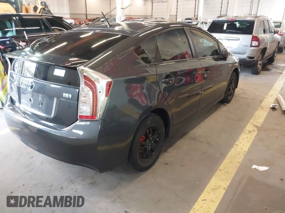 2015 Toyota Prius Four with VIN JTDKN3DU8F1983215, listed as a IAAI auction lot 41809447 with 135,899 mi miles. Bid and sale history available at carsss.com. Image 4.