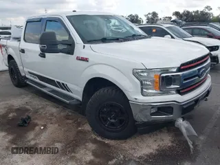 2018 Ford F-150 XL with VIN 1FTEW1EG9JFB89603, listed as a IAAI auction lot 41377545 with 167,146 mi miles. Bid and sale history available at carsss.com. Image 1.