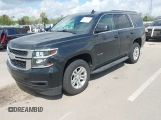 2019 Chevrolet Tahoe LT z VIN 1GNSKBKC6KR266831, wystawiony jako IAAI lot #42174593 z przebiegiem 103 199 mil mil oraz . Historia ofert i sprzedaży dostępna na DreamBid. Obrazek 2.