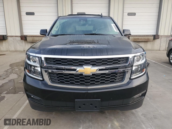 2019 Chevrolet Tahoe LT with VIN 1GNSKBKC2KR349527, listed as a Copart auction lot 58496695 with 128,590 mi miles and Salvage title. Bid and sale history available at DreamBid. Image 5.