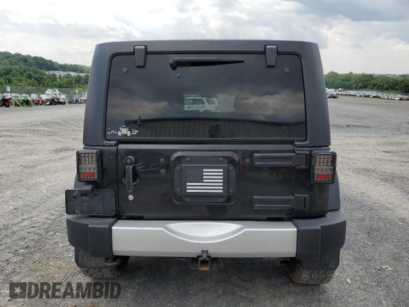 2017 Jeep Wrangler Unlimited Sport with VIN 1C4BJWDG3HL738241, listed as a Copart auction lot 60310865 with 113,526 mi miles and Salvage title. Bid and sale history available at DreamBid. Image 6.