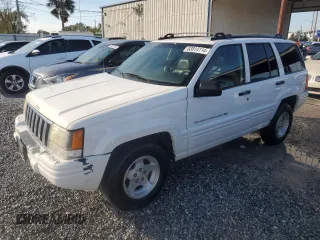 1998 Jeep Grand Cherokee Laredo with VIN 1J4GZ48Y9WC203024, listed as a Copart auction lot 83813114 with 105,044 mi miles and Non Repairable. Bid and sale history available at carsss.com. Image 1.