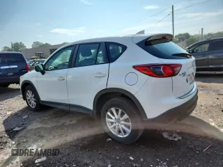 2016 Mazda CX-5 Sport with VIN JM3KE4BYXG0704194, listed as a Copart auction lot 62095735 with 93,970 mi miles and Salvage title. Bid and sale history available at DreamBid. Image 2.