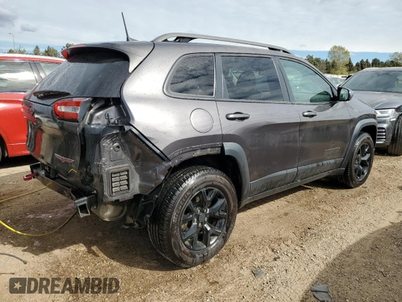 2018 Jeep Cherokee Trailhawk with VIN 1C4PJMBB2JD506327, listed as a Copart auction lot 75747364 with 186,413 mi miles and Salvage Title. Bid and sale history available at DreamBid. Image 3.