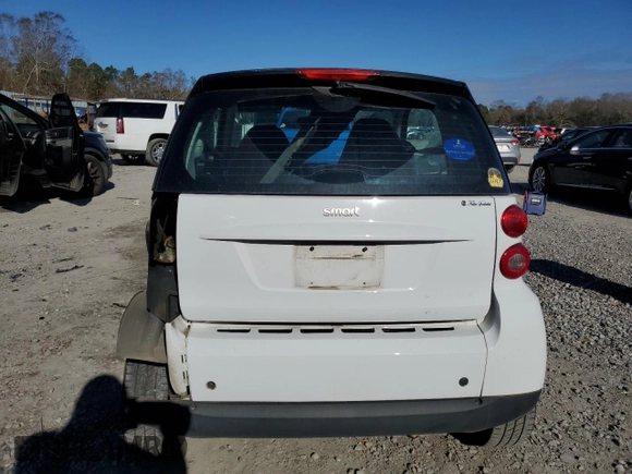 2012 Smart fortwo Pure z VIN WMEEJ3BA1CK559092, wystawiony jako Copart lot #85506924 z przebiegiem 47 806 mil mil oraz Szkoda całkowita • Salvage title. Historia ofert i sprzedaży dostępna na DreamBid. Obrazek 6.