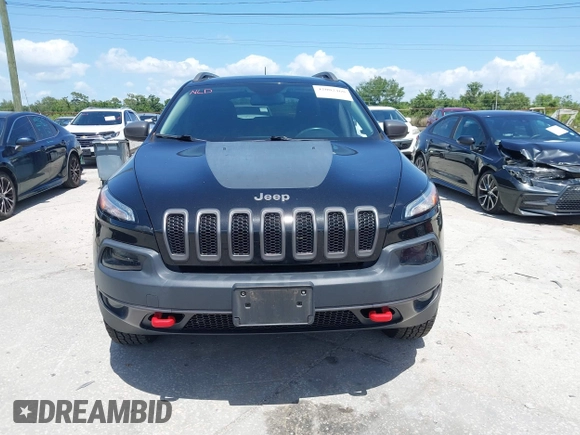 2017 Jeep Cherokee Trailhawk with VIN 1C4PJMBS9HW537962, listed as a IAAI auction lot 42002460 with 129,037 mi miles and . Bid and sale history available at DreamBid. Image 13.