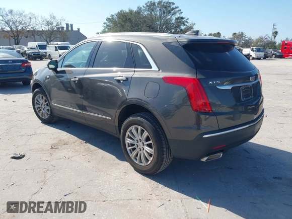 2019 Cadillac XT5 FWD with VIN 1GYKNARS5KZ143510, listed as a IAAI auction lot 41553279 with 53,943 mi miles and . Bid and sale history available at carsss.com. Image 3.