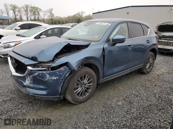 2017 Mazda CX-5 Touring with VIN JM3KFBCLXH0124451, listed as a Copart auction lot 51060275 with 126,807 mi miles and Salvage Title. Bid and sale history available at carsss.com. Image 1.