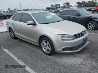 2014 Volkswagen Jetta TDI w/Premium with VIN 3VWLL7AJ3EM231190, listed as a IAAI auction lot 41722137 with 100,965 mi miles and . Bid and sale history available at DreamBid. Image 1.