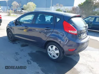 2013 Ford Fiesta SE with VIN 3FADP4EJ8DM221179, listed as a IAAI auction lot 41958070 with 197,454 mi miles. Bid and sale history available at carsss.com. Image 3.