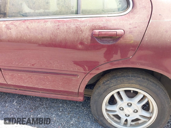1999 Nissan Sentra XE with VIN 3N1AB41D0XL107458, listed as a IAAI auction lot 42536232 with 119,701 mi miles and . Bid and sale history available at DreamBid. Image 15.
