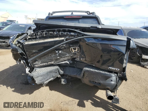 2023 Honda Ridgeline RTL-E with VIN 5FPYK3F71PB024149, listed as a Copart auction lot 50767465 with 40,943 mi miles and Salvage title. Bid and sale history available at DreamBid. Image 6.
