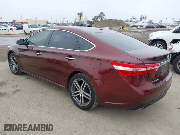 2013 Toyota Avalon XLE with VIN 4T1BK1EB1DU001297, listed as a IAAI auction lot 42041699 with 217,190 mi miles and . Bid and sale history available at DreamBid. Image 3.