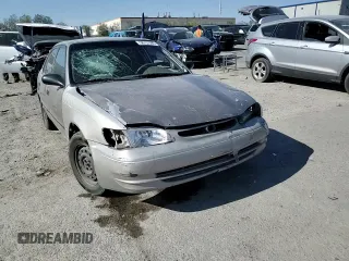 1999 Toyota Corolla VE with VIN 1NXBR12E9XZ158252, listed as a Copart auction lot 58757595 with 232,776 mi miles and Salvage title. Bid and sale history available at DreamBid. Image 14.