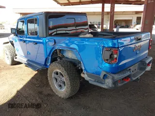 2021 Jeep Gladiator Rubicon with VIN 1C6JJTBGXML516164, listed as a IAAI auction lot 41837544 with 48,197 mi miles and . Bid and sale history available at DreamBid. Image 3.