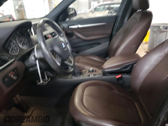 2017 BMW X1 xDrive28i with VIN WBXHT3C34H5F87048, listed as a Copart auction lot 67545012 with 76,666 mi miles. Bid and sale history available at carsss.com. Image 7.