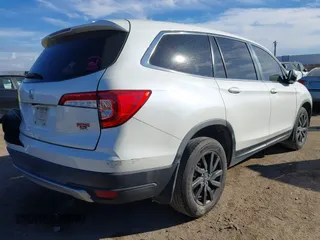 2019 Honda Pilot EX-L with VIN 5FNYF5H59KB017415, listed as a IAAI auction lot 41340852 with 125,433 mi miles and . Bid and sale history available at DreamBid. Image 4.