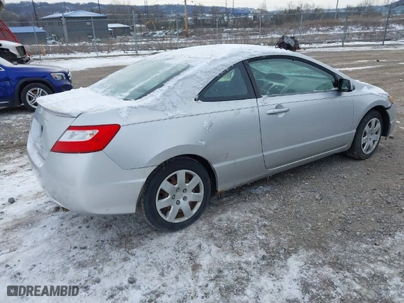 2007 Honda Civic Cpe LX with VIN 2HGFG12627H505932, listed as a IAAI auction lot 41609140 with 188,438 mi miles. Bid and sale history available at carsss.com. Image 4.