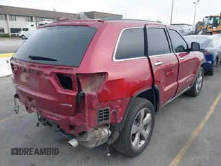 2014 Jeep Grand Cherokee Limited with VIN 1C4RJEBM1EC382529, listed as a IAAI auction lot 40929174 with 154,851 mi miles. Bid and sale history available at carsss.com. Image 4.