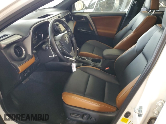 2016 Toyota RAV4 SE with VIN JTMJFREV0GD190302, listed as a Copart auction lot 59330345 with 102,069 mi miles and Salvage title. Bid and sale history available at DreamBid. Image 7.