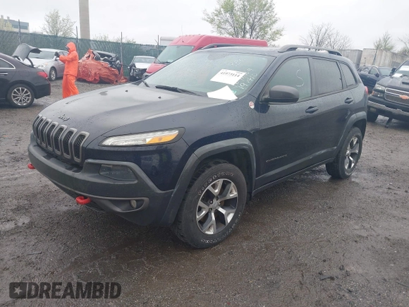 2014 Jeep Cherokee Trailhawk with VIN 1C4PJMBB5EW120432, listed as a IAAI auction lot 41973114 with 88,795 mi miles. Bid and sale history available at carsss.com. Image 2.