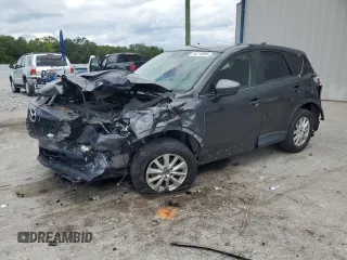 2014 Mazda CX-5 Touring z VIN JM3KE2CY4E0380160, wystawiony jako Copart lot #56710885 z przebiegiem 126 095 mil mil oraz Szkoda całkowita • Salvage title. Historia ofert i sprzedaży dostępna na DreamBid. Obrazek 1.