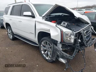 2016 GMC Yukon SLT z VIN 1GKS2BKCXGR305232, wystawiony jako IAAI lot #41921104 z przebiegiem 113 969 mil mil oraz . Historia ofert i sprzedaży dostępna na DreamBid. Obrazek 1.